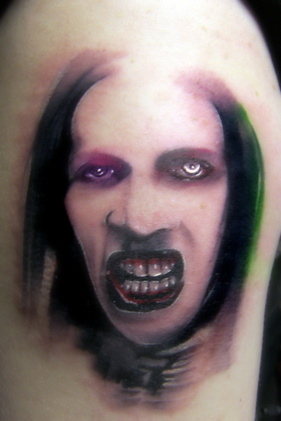 Looking for unique  Tattoos? Marilyn Manson